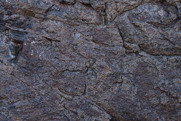 The texture of the rock. Monolith. Granite surface