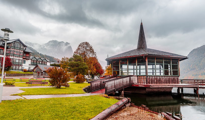 The lakeshore promenade in Grundlsee and of the Mountain Backenstein on background.