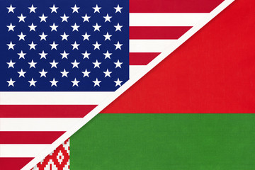 Fototapeta premium USA vs Belarus national flag from textile. Relationship between american and european countries.