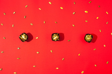 Christmas composition. Handmade sweets on a red background. View from above.