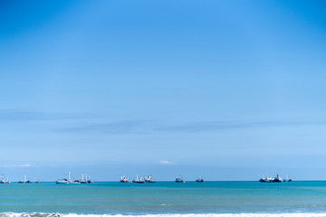 Obraz premium Fishing port of Manta, Ecuador, early in the morning, blue sky.