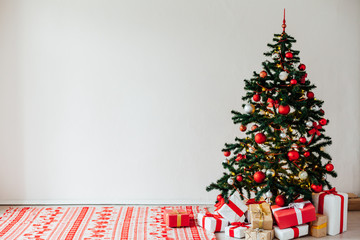Christmas tree with gifts Of New Year's interior decor as a background
