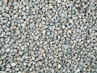 Rocky surface or the stone used to make the asphalt road