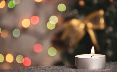 christmas candle  on garland background	
