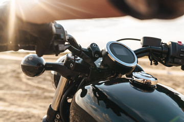 Man biker on bike outdoors at the desert field.