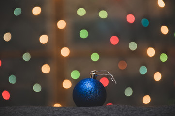 Fototapeta na wymiar christmas toy on garland background 