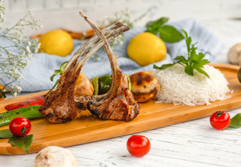 ribs kebab with rice and vegetables