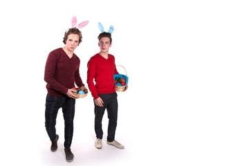 Easter. Two funny young guys. White background.