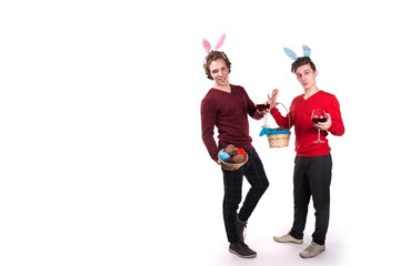Easter. Two funny young guys. White background.