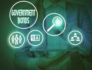 Writing note showing Government Bonds. Business concept for debt security issued by a government to...