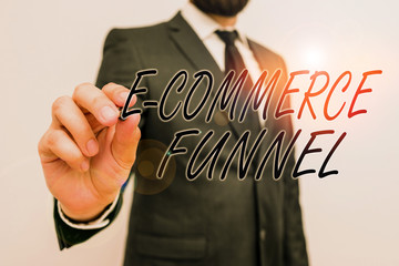 Writing note showing E Commerce Funnel. Business concept for a tool used to optimise the usability of the online assets Male human with beard wear formal working suit clothes hand