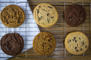 Birdseye view cookies high protein healthy balanced within reason on baking rack with white cloth underneath chocolate light milk dark sweets calories delicious