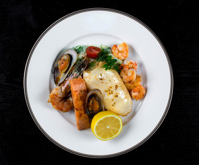 seafood with spices sprinkled with lemon juice