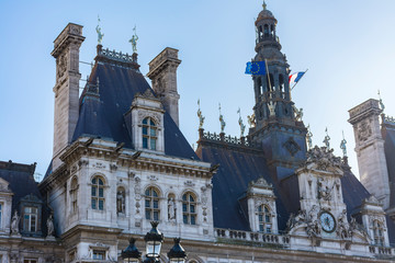 Fototapeta premium Roofs and tower bell of the city hall