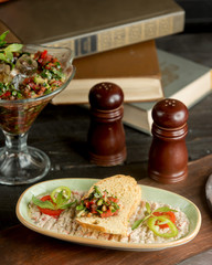 vegetable salad with white bread and sauce