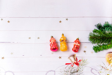 Old toys lie on a wooden board. Selective focus.