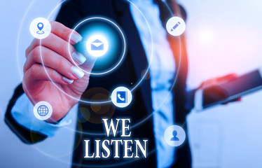 Text sign showing We Listen. Business photo showcasing Group of showing that is willing to hear anything you want to say