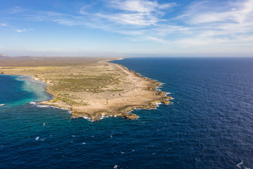Aerial view of coast of Curaçao in the Caribbean Sea with turquoise water, cliff, beach and...