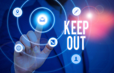 Conceptual hand writing showing Keep Out. Concept meaning to stop someone or something from going into a place Danger sign