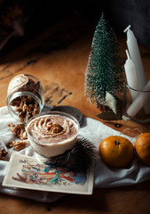 christmas still life with candle and decorations