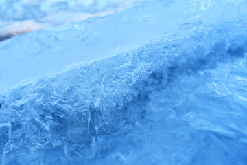 Obraz na płótnie Canvas snowy surface blue and white, ice, winter, new year