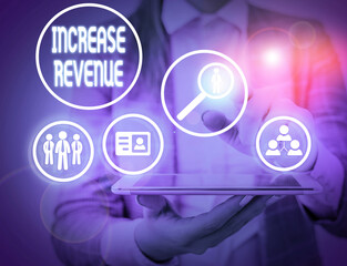 Writing note showing Increase Revenue. Business concept for increase in a company s is sales from one period to the next