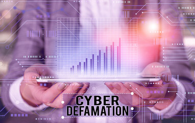 Handwriting text writing Cyber Defamation. Conceptual photo slander conducted via digital media...