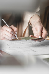 Woman fashion designer created the sewing pattern