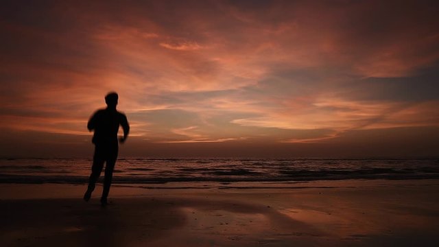 Man Running In Beach And Relaxing