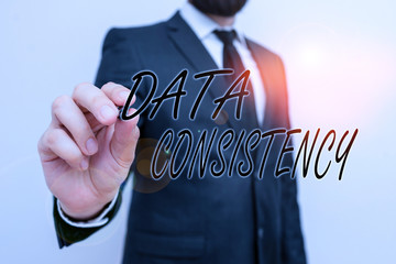 Writing note showing Data Consistency. Business concept for data values are the same for all...