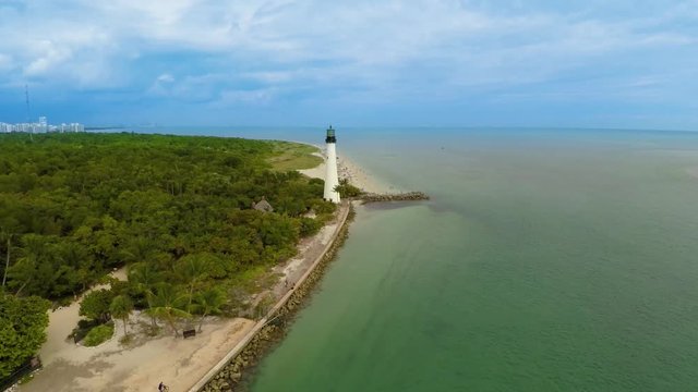 Key Biscayne lighthouse Aerial fly north and turn