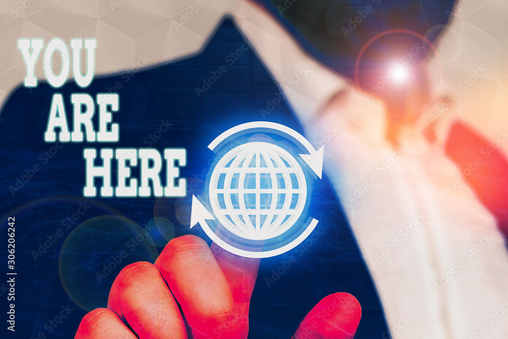 Poster conceptual hand writing showing you are here. concept meaning this is your location reference point 