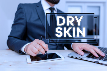 Writing note showing Dry Skin. Business concept for uncomfortable condition marked by scaling or...