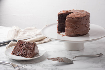 american traditional chocolate cake coated with icing