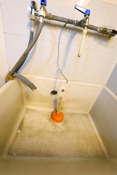 plunger in the washbasin