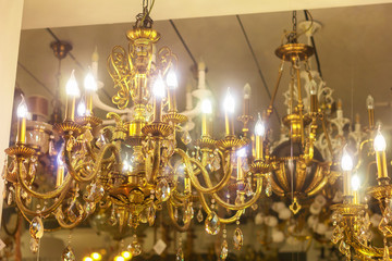 Fototapeta na wymiar gold chandelier antique luxury vintage jewels decor candle bulb lamp