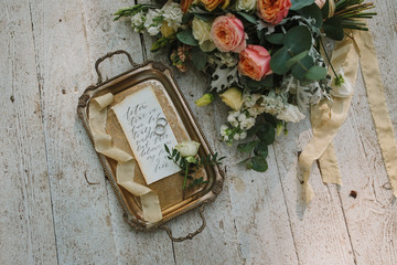 Graphic arts of beautiful wedding calligraphy cards with flower and chiffon bobbins on wood...