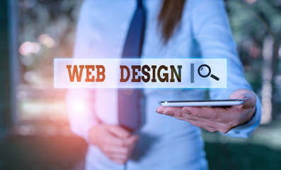 Writing note showing Web Design. Business concept for Website development Designing and process of creating websites Business woman in shirt holding laptop and mobile phone