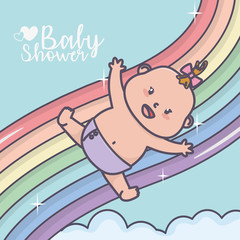 baby shower happy little girl falling on rainbow