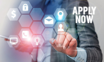 Writing note showing Apply Now. Business concept for An act of a demonstrating to acquire the job related to the profession