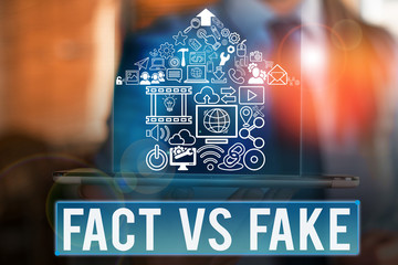 Word writing text Fact Vs Fake. Business photo showcasing Rivalry or products or information...
