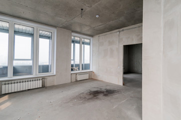 Russia, Moscow- July 16, 2019: interior room. rough repair for self-finishing. interior decoration, bare walls of the room, stage of construction