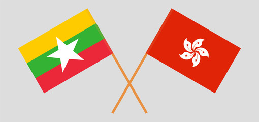 Crossed flags of Myanmar and Hong Kong