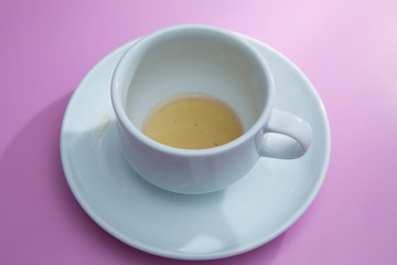 coffee cup over pink background . sugar .Glass cup isolated on a pink background with clipping path. Front view .
