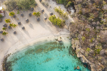 Aerial view of coast of Curaçao in the Caribbean Sea with turquoise water, cliff, beach and...
