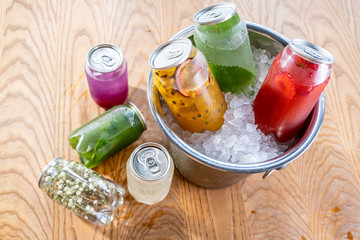 Healthy smoothie from summer fruits and berries in a jars with straws