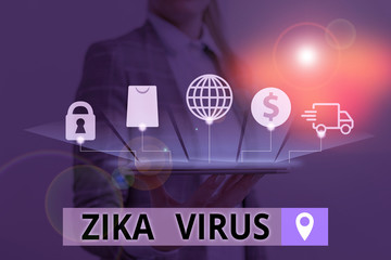 Conceptual hand writing showing Zika Virus. Concept meaning caused by a virus transmitted primarily...