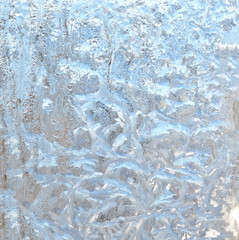 Frost on the window glass, frosty drawing.