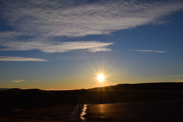 sunset over the mountain with evening sky