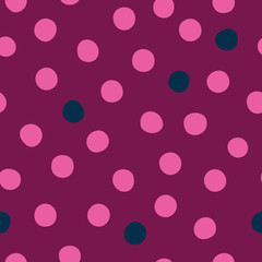 Light pink and dark blue polka dots on burgundy background vector pattern.